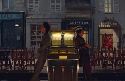Timothée Chalamet and Lyna Khoudri in the film THE FRENCH DISPATCH. Photo Courtesy of Searchlight Pictures. © 2021 20th Century Studios All Rights Reserved