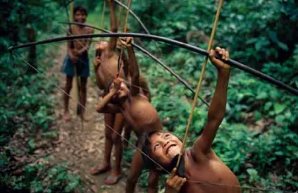 Yanomami boys practising hunting, Amazon, Brazil