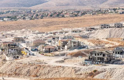 Nieuwe huizen worden gebouwd in de Israëlische nederzetting Eldad, ten zuiden van Bethlehem op de Westelijke Jordaanoever. De nederzettingen zijn illegaal volgens het internationaal recht, maar ondanks de veroordeling van de internationale gemeenschap bl
