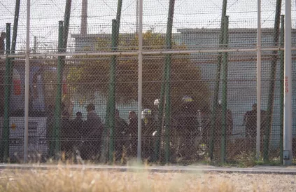 Vluchtelingen bij het hek van Mellila - Foto: Association Marocaine des Droits Humains - Section Nador