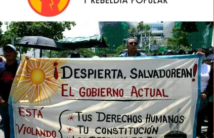 ‘Word wakker, Salvadoranen. De huidige regering schendt uw mensenrechten, uw grondwet, uw rechten op een woonst, moeder aarde. Foto: Marleen Bosmans 