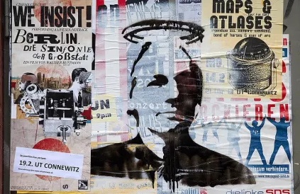 Muurposter in Leipzig (D). Foto: Herder3/CC BY-SA 3:0