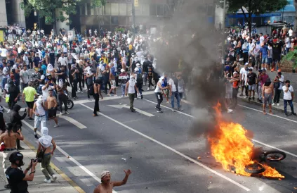 Gewelddadige rellen door medestanders van de oppositie op 29 juli in Caracas. Foto: REDH